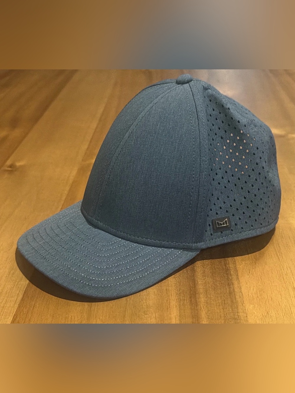 Melin A-Game Hydro Performance Snapback Hat Heather Ocean Blue Classic Fit